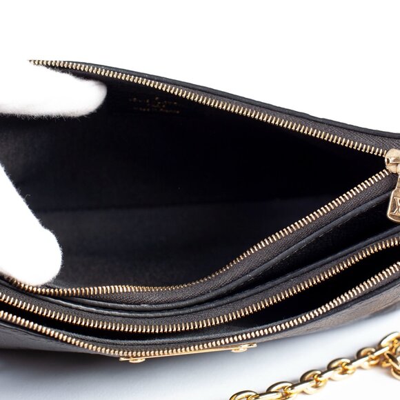 Authentic Louis Vuitton Black Monogram Empreinte Leather Liv Pochette - Picture 4 of 9